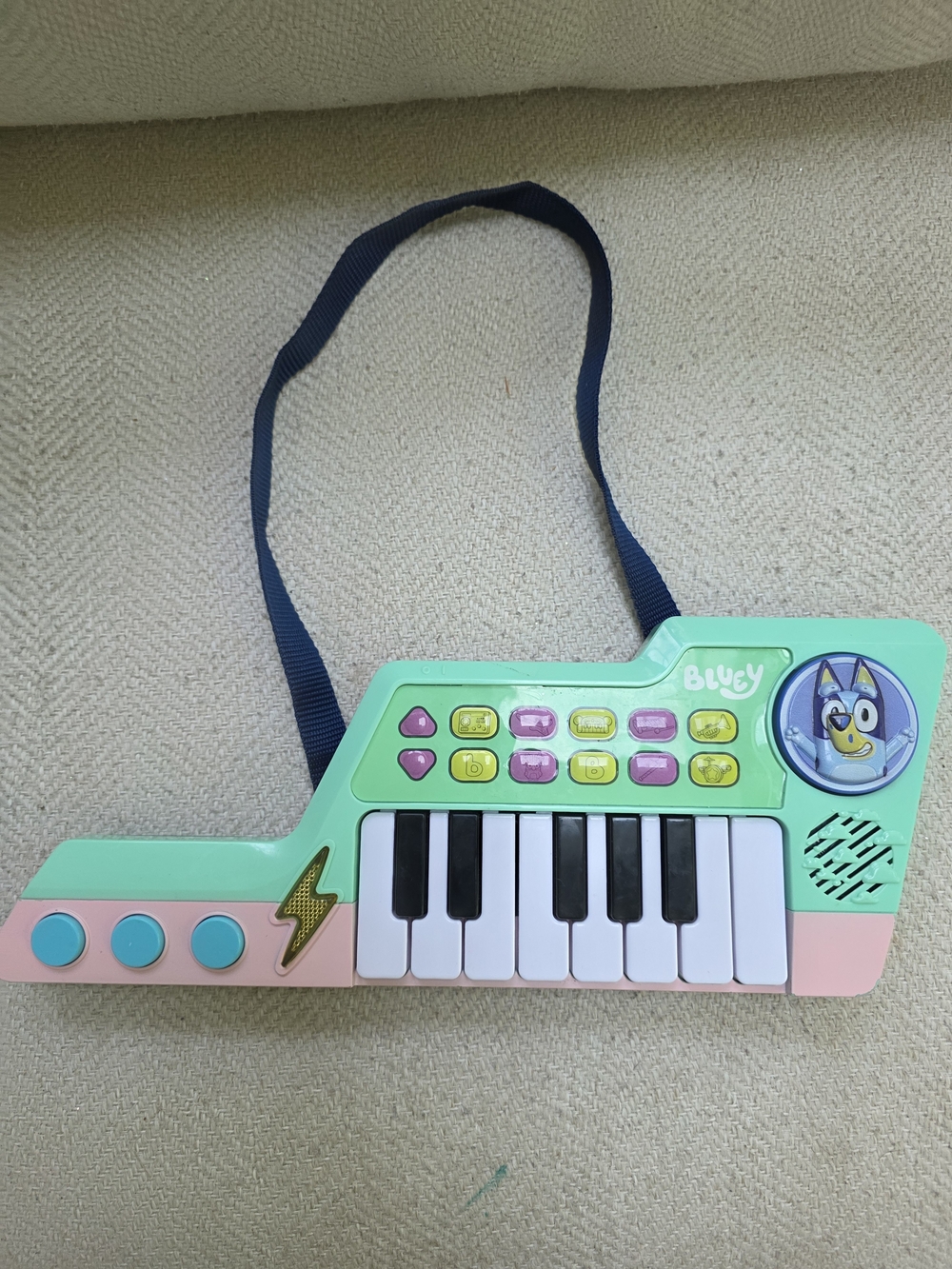 VTECH Bluey Mint Green & Pink Child’s Shoulder Keyboard Toy